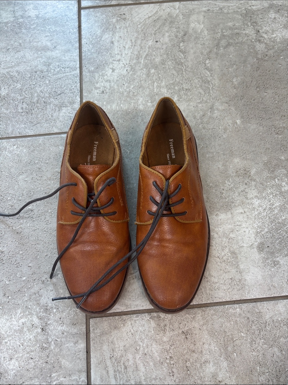 Brown oxford style lace up shoes